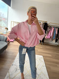 Oversize stiliaus rožiniai marškiniai